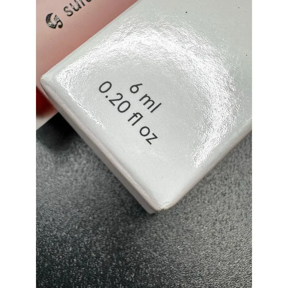 NWT glossier g suit soft touch lip creme in color strike
